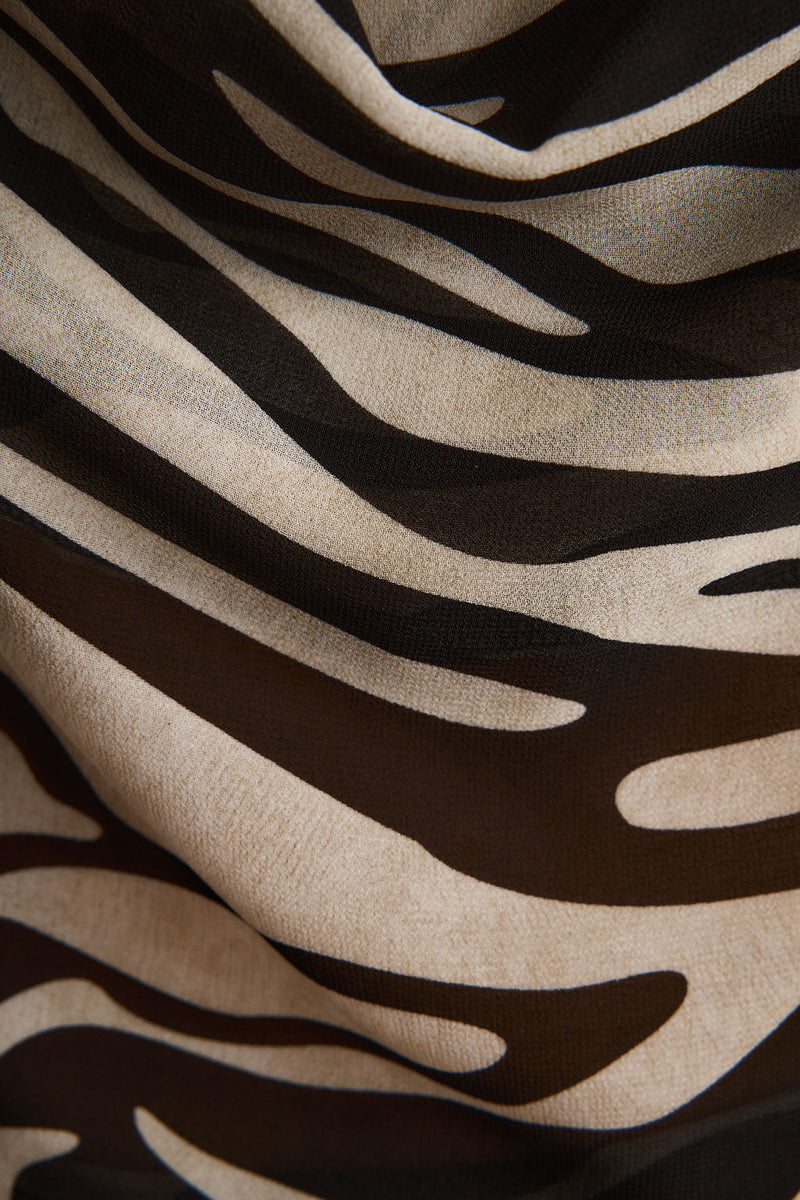 Celia Zebra Maxi Skirt shown in a complementary styling arrangement.