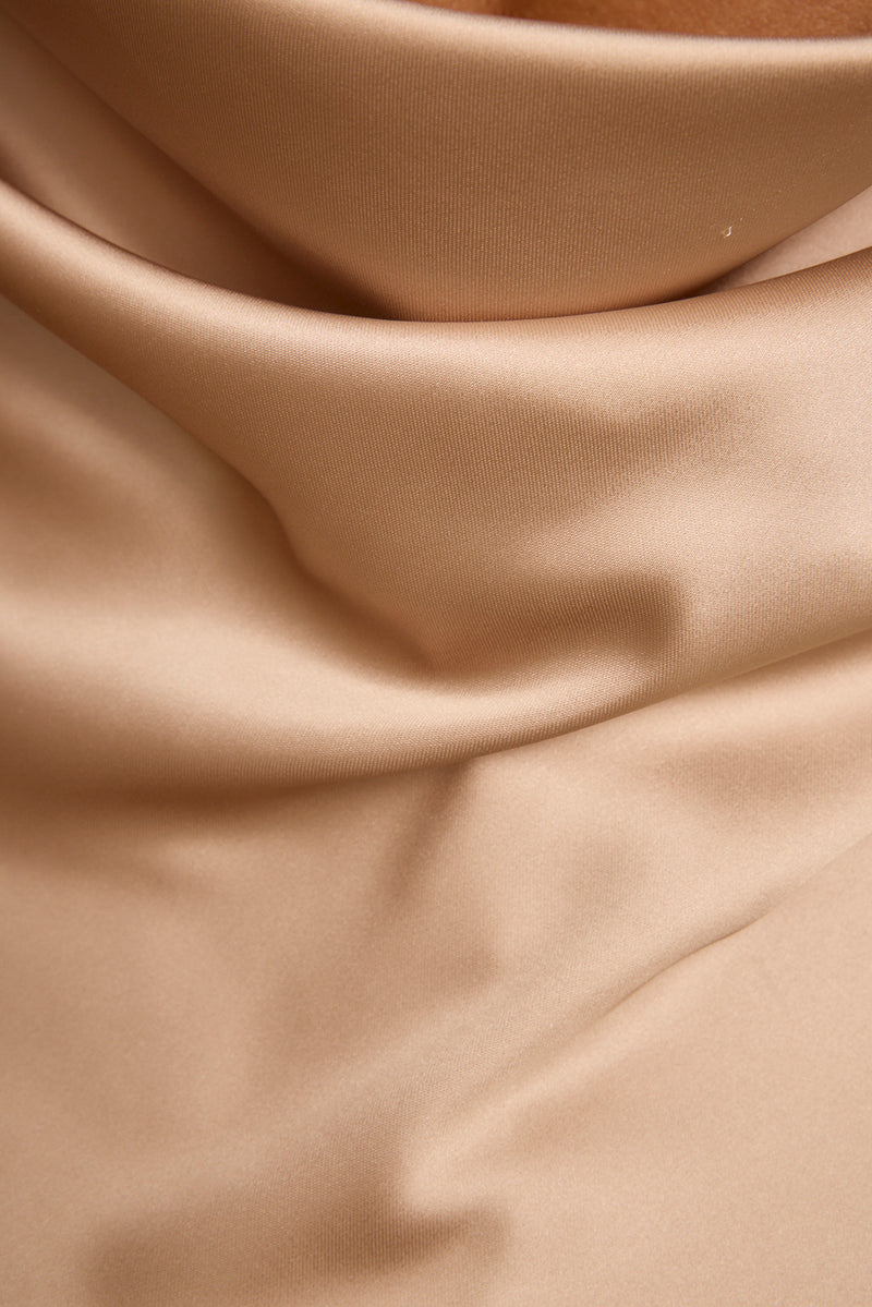 Soft champagne satin maxi dress detail showing the draped cowl neckline up close.